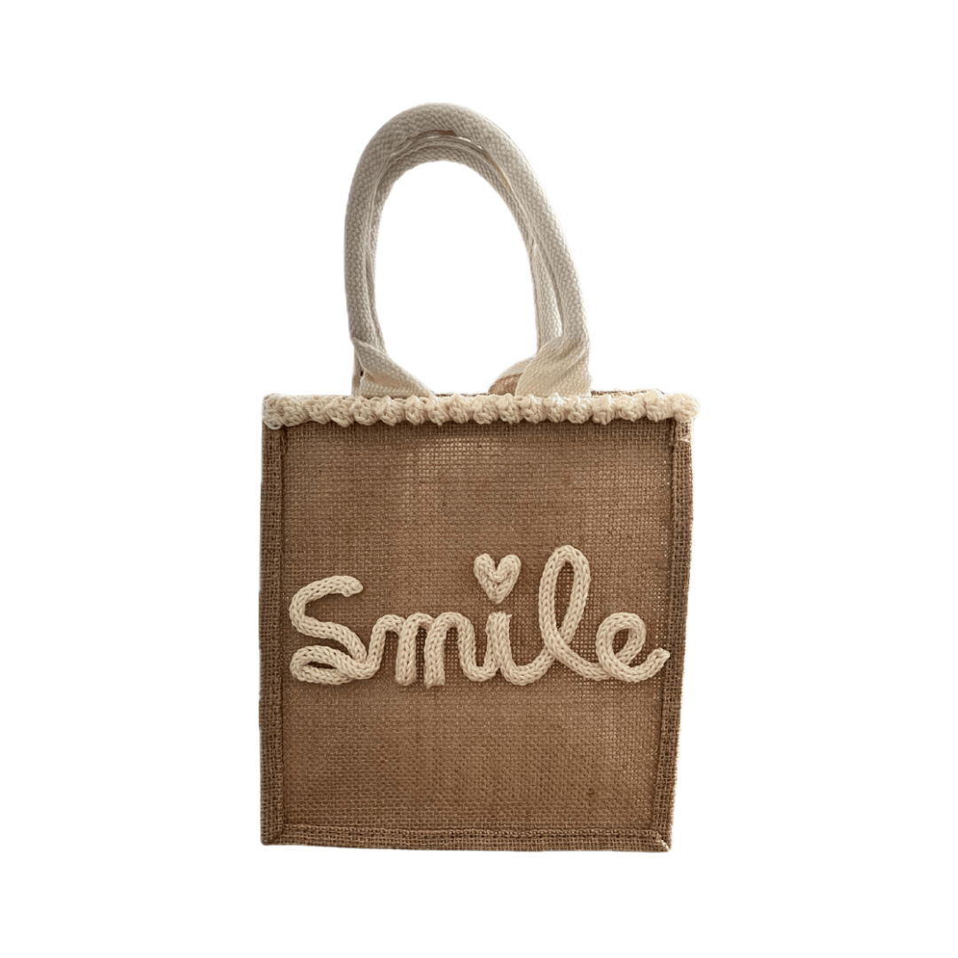Borsa in juta con scritta Smile