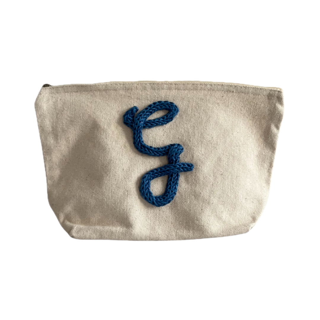 Pochette blu con lettera G