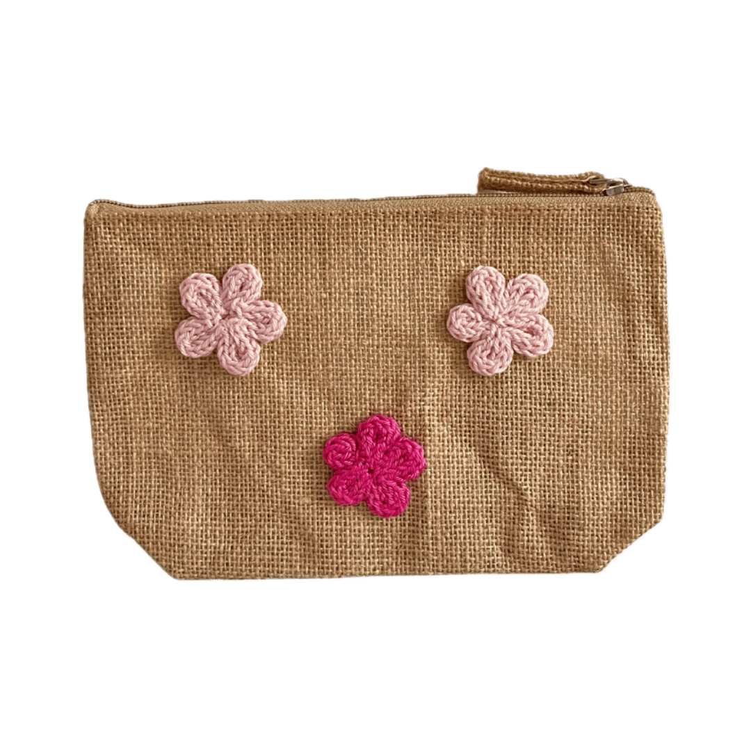 Pochette in juta con fiori rosa